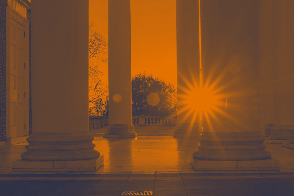 Sun flaring through columns